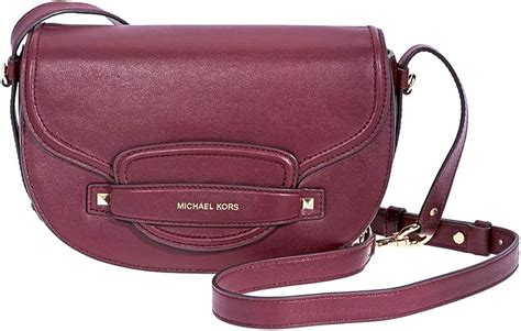 michael michael kors cary medium saddle bag|Michael Kors burgundy crossbody bag.